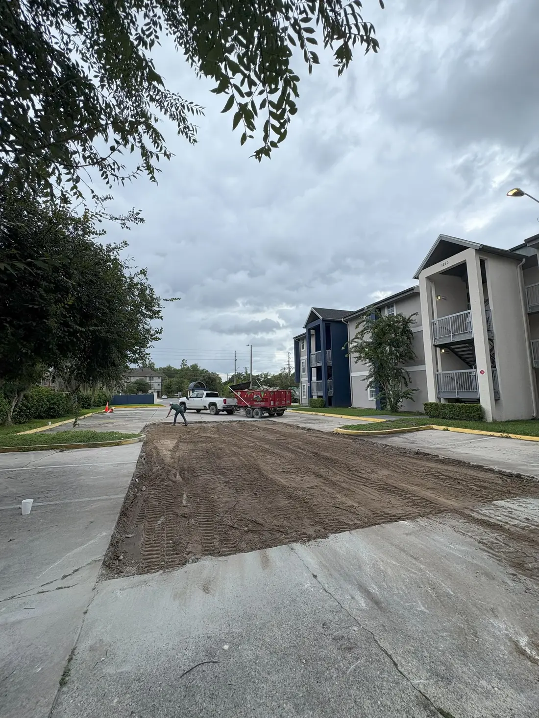 Building pad compacted in lifts for new construction